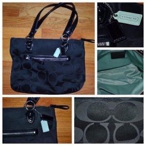 Black Coach logo handbag